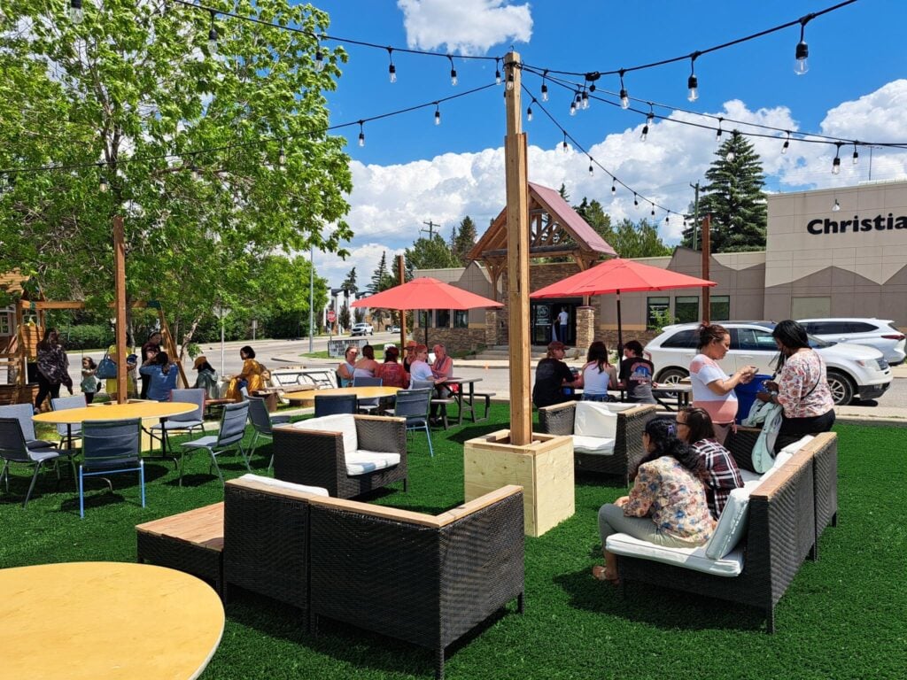 A photograph of Killarney pop-up plaza being well used by the community.